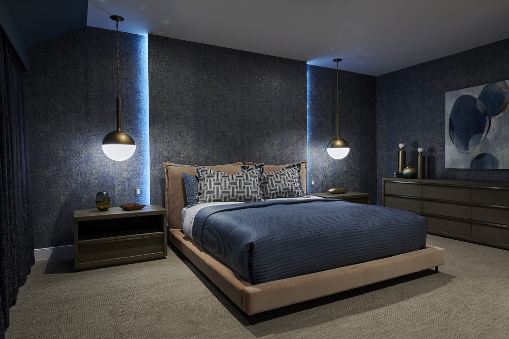 Modern navy bedroom with pendant lights